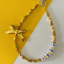 Gold Ribbon Name Charm